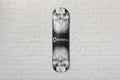 Planche de skate Cannonball Twins - deux crânes en miroir